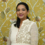 Portrait of Dr. Porrselvi A.P, mother of Umaiyini from Chennai, sharing her review about eduSeed.